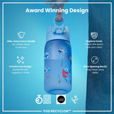 A light-blue water bottle, featuring cartoon sharks and other sea creatures, sits against a white background. The bottle displays the word 