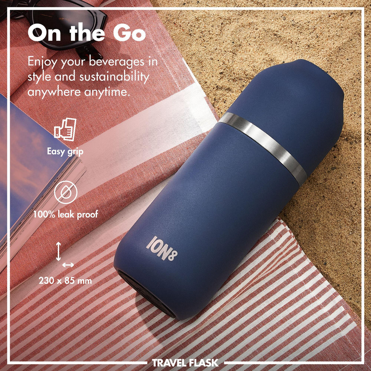 A sleek dark gray insulated bottle stands upright featuring a silver band in the middle on a plain white background with "ION8" printed at the bottom.