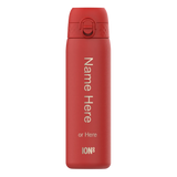 A red reusable water bottle stands upright featuring the text 